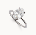 Oval Cut with Reverse Halo Design - Choice of .50ct /.80ct / 1.00ct or 1.20ct Centre Diamond